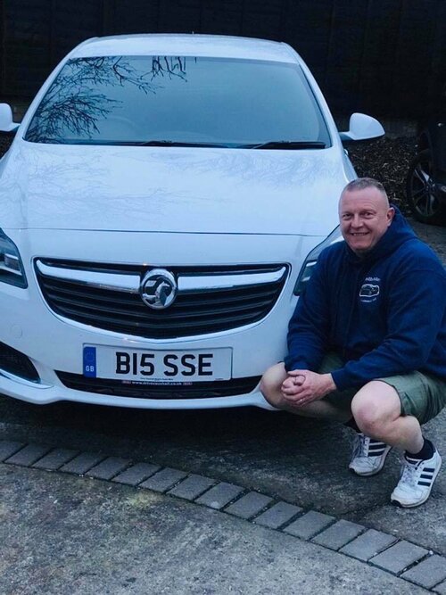 Andy Biss, Dentbuster, with a customer's car